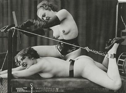 Vintage BDSM torture scenario with unusual rack device. Photo: Ostra Studio (c. 1930s).