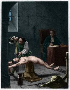 A woman subjected to water torture by the Inquisition to force a confession.