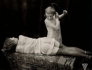 Still from the whipping fetish film Dressage au Fouet (note triangle logo).