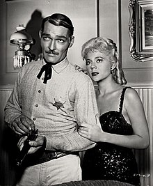 John Russell and Peggie Castle in Lawman (1962)