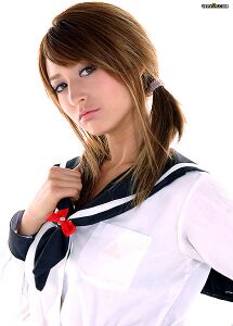 A woman wearing a middy blouse